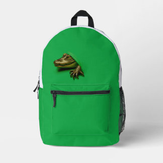 a reptile ripping through printed backpack
