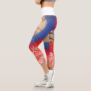 A rich paisley pattern combining red and blue ton Capri Leggings
