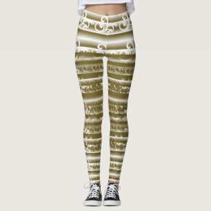 A richly coloured rug features a symmetrical geome leggings