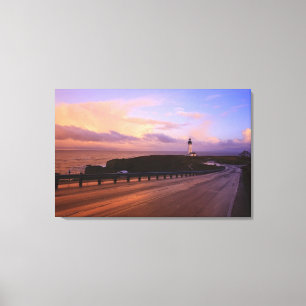 A Road & A Lighthouse Along The Coast At Sunset Canvas Print