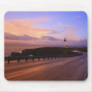 A Road & A Lighthouse Along The Coast At Sunset Mouse Mat