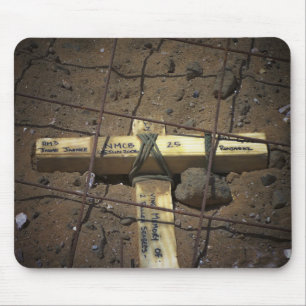 A road repair crew places a cross mouse mat
