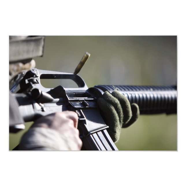 A round flies from the chamber of an M-16A2 Photo Print (Front)