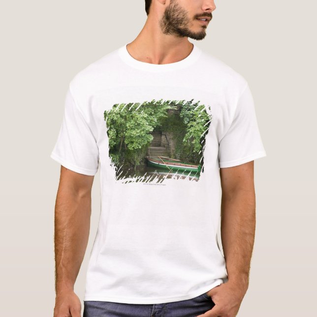A Row Boat Roped At Some Stairs Along The Shore T-Shirt (Front)