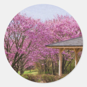 a row of cherry blossom trees and hut classic round sticker