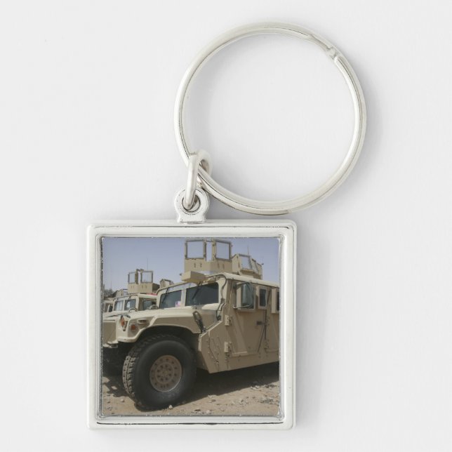 A row of humvees from Task Force Military Polic Key Ring (Front)