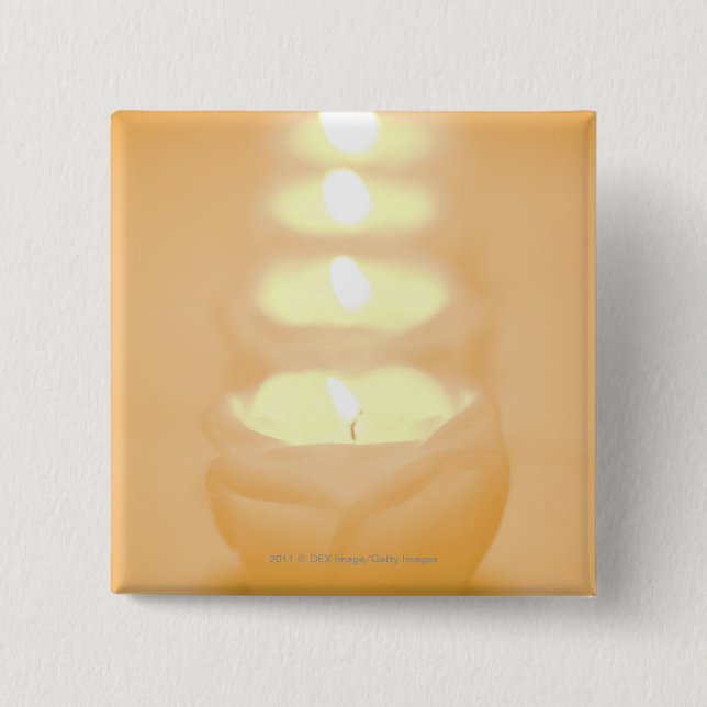 A row of lit candles 15 cm square badge (Front)