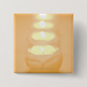 A row of lit candles 15 cm square badge