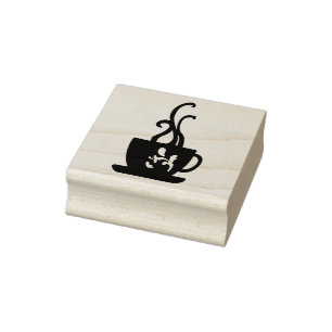 A rubber stamp of a steaming cup of tea