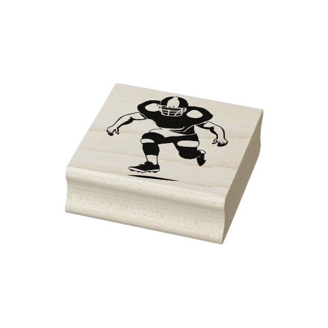 A rubber stamp of an American football player (Stamp)