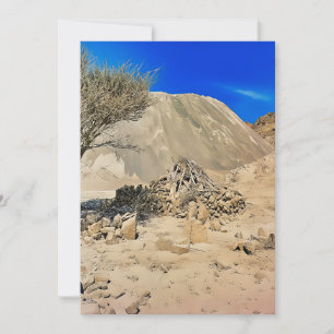 A rugged, arid landscape holiday card