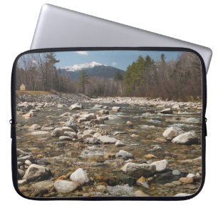 A running stream river with clear water flowing wi laptop sleeve