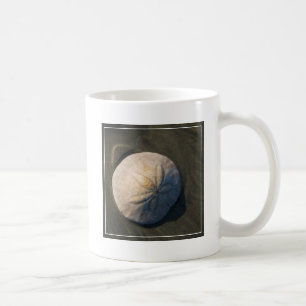 A Sand Dollar On The Beach Coffee Mug