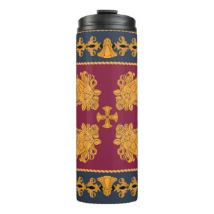 A scarf with a pattern of gold heads of lions and  thermal tumbler