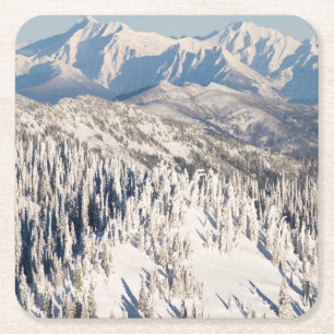 A Scenic View of Snowy Mountains and Trees. Square Paper Coaster