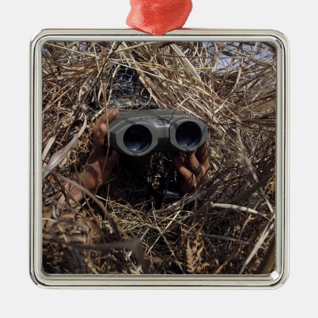 A scout observer practices observation techniqu metal tree decoration (Front)