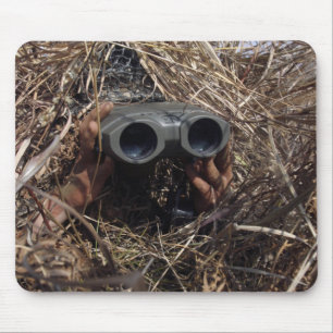 A scout observer practices observation techniqu mouse mat