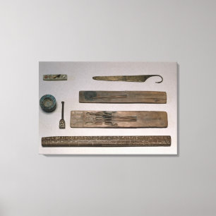 A scribe's instruments (wood, ivory, bronze and en canvas print