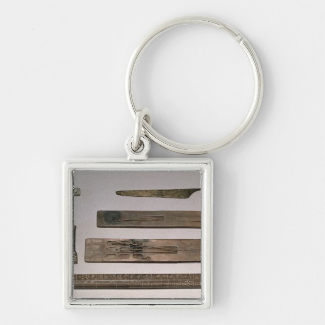 A scribe's instruments (wood, ivory, bronze and en key ring (Front)