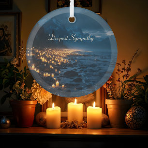 A sea of candlelights on the beach, sympathy glass tree decoration