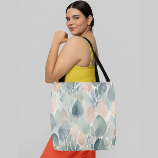 A seamless pattern of abstract leaf shapes tote bag