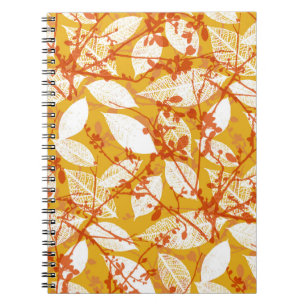 A seamless vintage background pattern of autumn le notebook