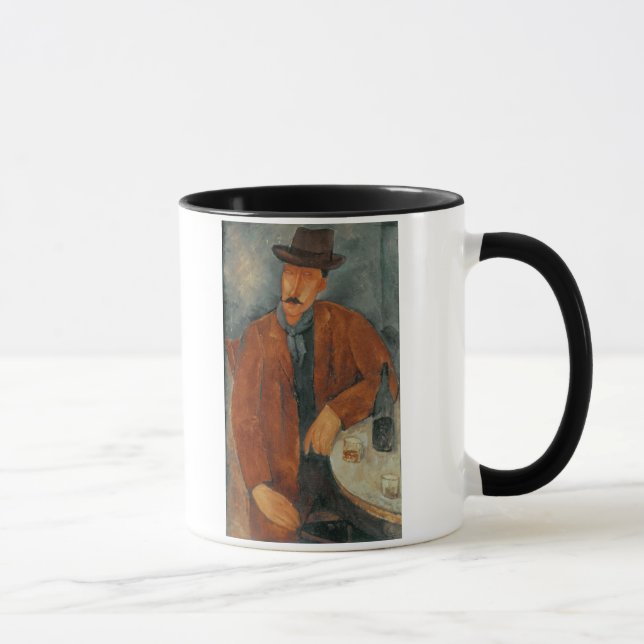 A seated man leaning on a table mug (Right)
