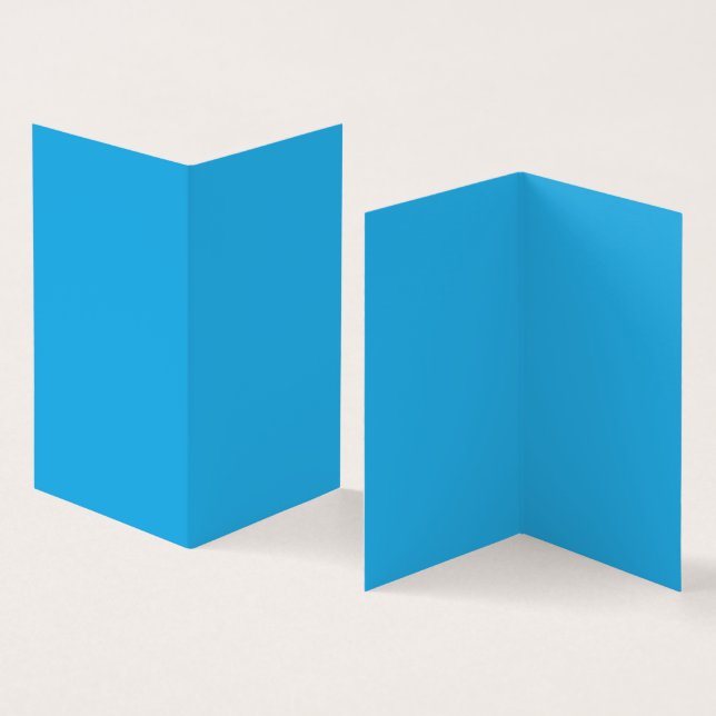 A serene blue sky with a few scattered white cloud (Inside and Outside)