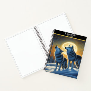 A serene wolf howls at the luminous moonlight notebook