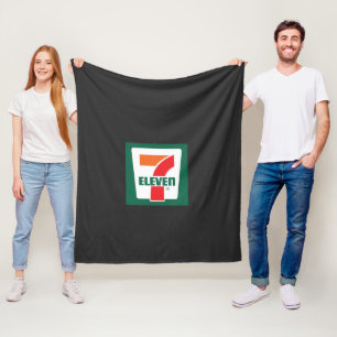 a seven seven logo on a green background fleece blanket