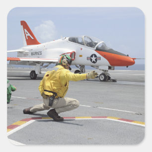 A shooter aboard the aircraft carrier square sticker