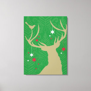 A silhouette of a deer with stars hanging from its canvas print