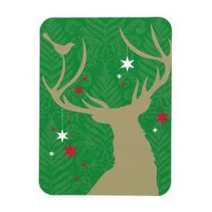 A silhouette of a deer with stars hanging from its magnet