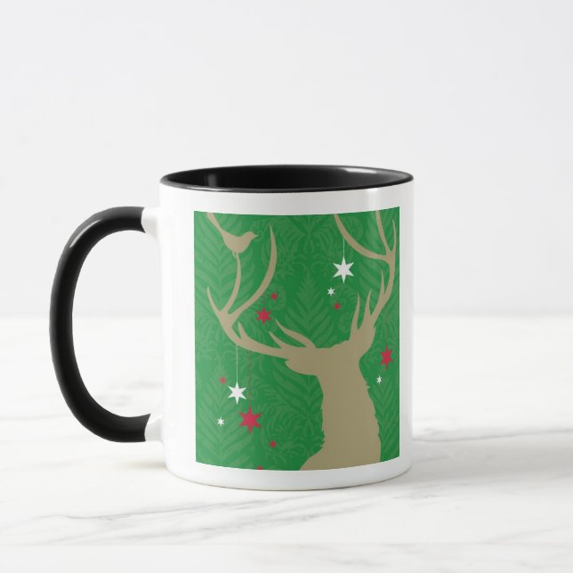 A silhouette of a deer with stars hanging from its mug (Left)