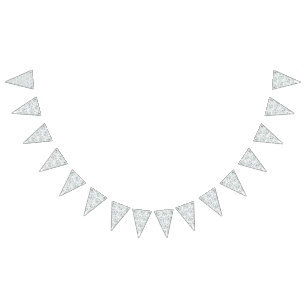 A silver drop splashes into a pool of white liquid bunting