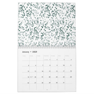A silver drop splashes into a pool of white liquid calendar
