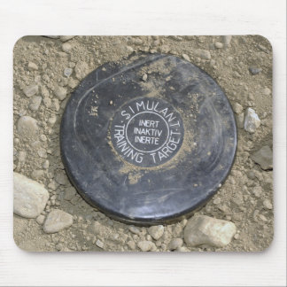 A simulated land mine mouse mat