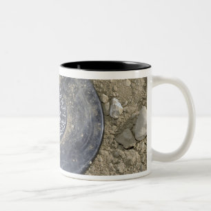 A simulated land mine Two-Tone coffee mug