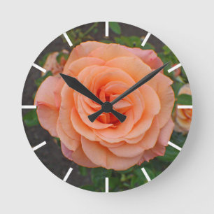 A Single Orange Flower Round Clock