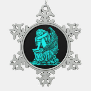 A sleeping Angel on the Stone Snowflake Pewter Christmas Ornament