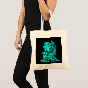 A sleeping Angel on the Stone Tote Bag