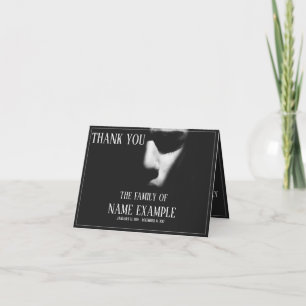 A sleeping face in half shadow card