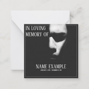 A sleeping face in half shadow card