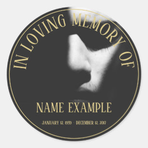 A sleeping face in half shadow classic round stick sticker