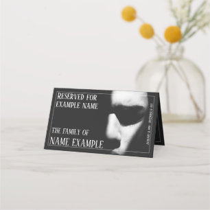 A sleeping face in half shadow place card