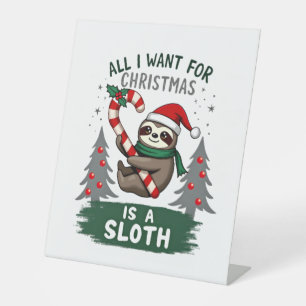 A Sloth For Christmas. Cute, Christmas Sloth With Pedestal Sign