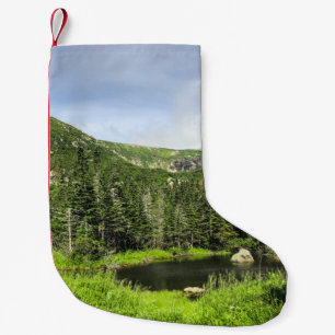A small pond in the valley of the mountains in the christmas stocking