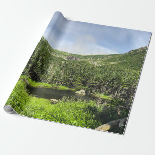 A small pond in the valley of the mountains in the wrapping paper
