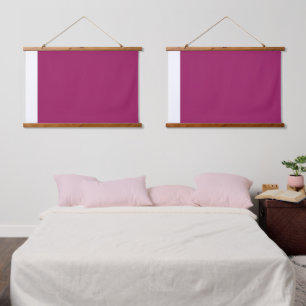 A smooth purple background with a sharp white bord hanging tapestry