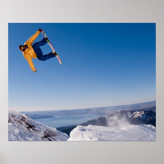 A snowboarder spins off a jump in Argentina Poster (Front)